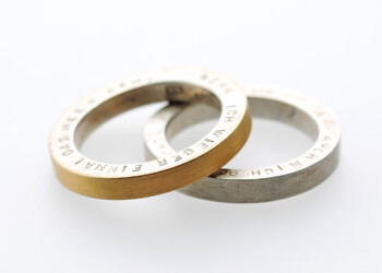 Ringe in Silber und Gelbgold 750 mit punziertem Text